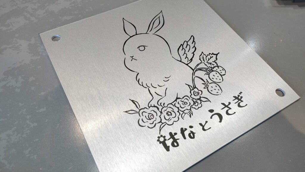 店舗入り口用看板カッティングシート貼り付け